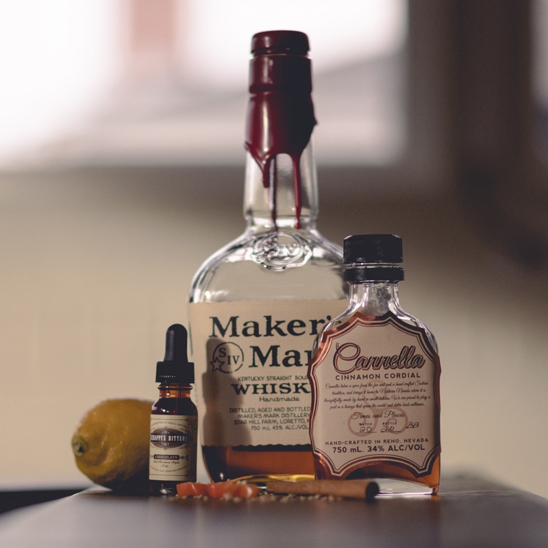 Whiskey and pomegranate cocktail ingredients